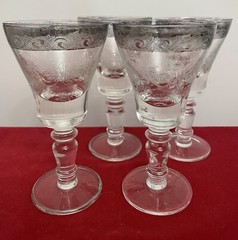 Lot of 4 hand-blown Murano glass wine glasses with engraving and silver rim