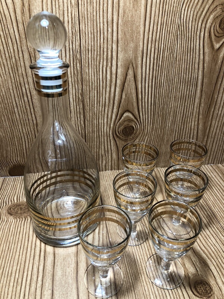 Vintage clear glass 24k gold trim Decanter ￼ and cordial set. 1950s Russia ￼