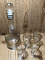 Vintage clear glass 24k gold trim Decanter ￼ and cordial set. 1950s Russia ￼