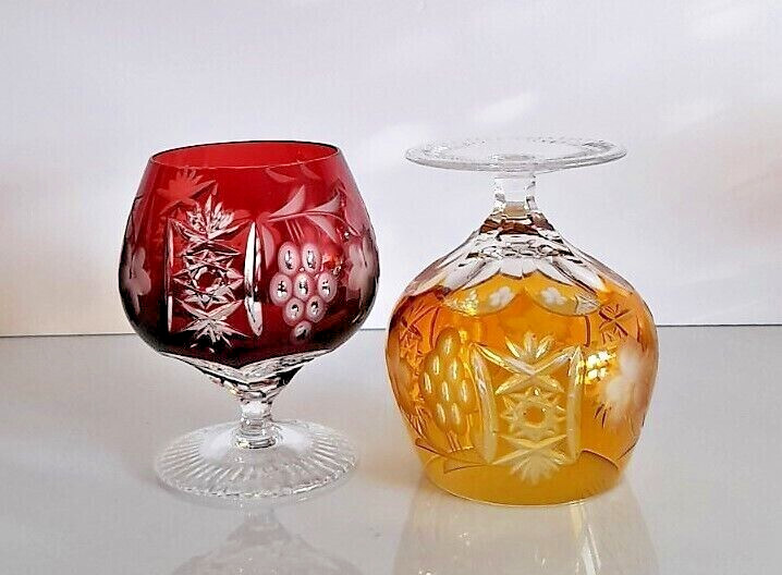 PAIR AJKA MARSALA YELLOW and RUBY RED CUT TO CLEAR LEAD CRYSTAL BRANDY GLASSES