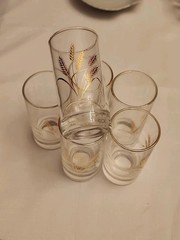 6 gold rimed juice glasses with 22 K gold wheat