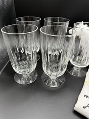 (6) Footed Crystal Water/Juice Glasses-5 1/2″ x 3″ with a wafer Design on stem.