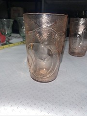 Set of 4 pink juice glasses (4-3/4”h) with fruit motif. Made in Italy