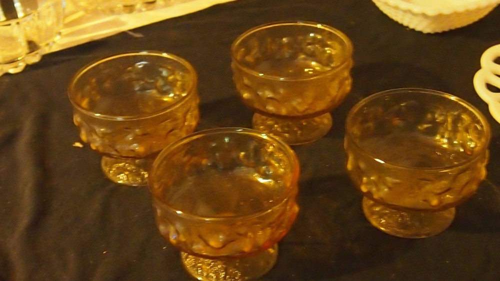 Unmarked Set of 4 Amber Pressed Glass Goblets, Round Textured Footed Cups