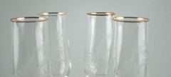 Set of four champagne flutes with a hand carved design Bird & Flowers Beautiful