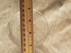 Vintage Crystal Glassware holds 10 ounces of liquid. The glass is 8 inches tall