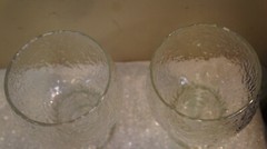 PAIR OF CLEAR DRINKING GLASSES 5.25 INCHES TALL