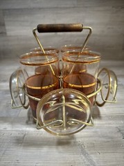 MCM Caddy 4 Glasses & Coasters Barware Set Tortoise Faux Wood Gold Rim Vintage