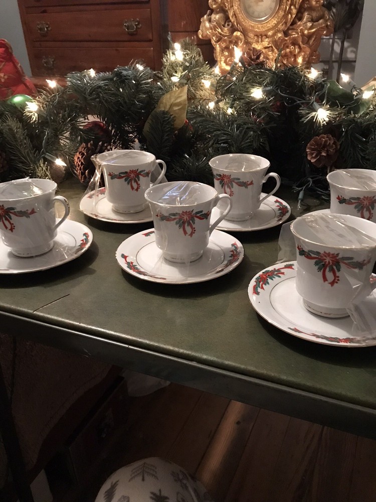 U R BUYING ONE SET Poinsettia & Ribbons￼ ￼Fine-porcelain china 1 cup 1 saucer