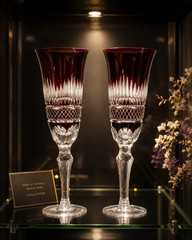 Pair of vintage Bohemian dark red cut to clear crystal Champagne flutes
