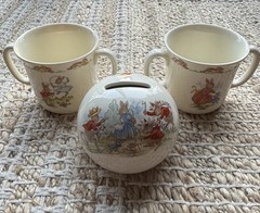 Royal Doulton “Bunnykins” 3 Piece Set (2) Double Handle Cup & (1) Piggy Bank