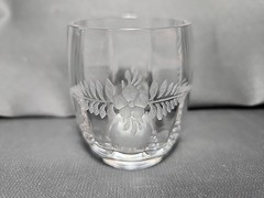 Antique etched glass cordial glass with floral and leaf motifs.