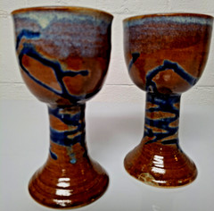 Pair signed Schaefer studio pottery goblets, brown blue, medium size