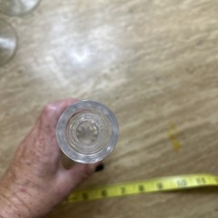 This is an 8-inch Atlantis Crystal Cameo bud vase with vertical fluting.