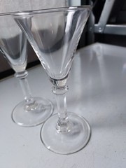 Set of 2 cocktail, glasses, 6 inches tall and 2 and a 1/2 inches wide.