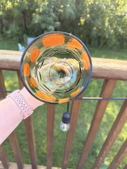 Vintage 1970s Bartlett-Collins orange smiley face green glass goblet