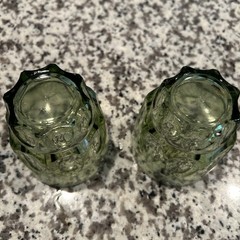 A pair of vintage Hazel Atlas avocado green Thumbprint textured glass tumblers.