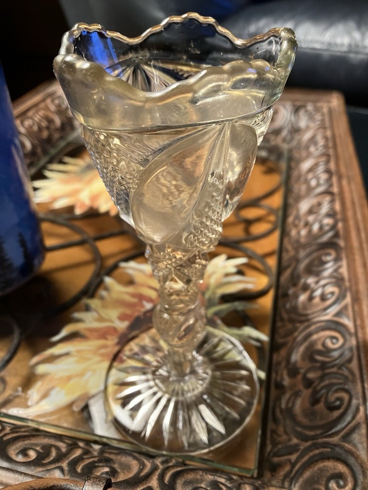 Early American Pattern Glass Wine Glass with a ruffled edge grape vine Pattern