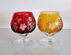 PAIR AJKA MARSALA YELLOW and RUBY RED CUT TO CLEAR LEAD CRYSTAL BRANDY GLASSES
