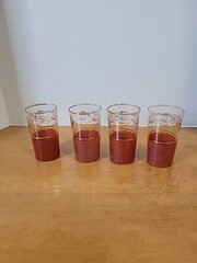 VTG Mid Century Barware With Red Textured Bottom And Gold Trim Set Of 4.