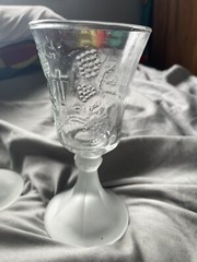Two vintage clear wine goblets with frosted stems in last supper