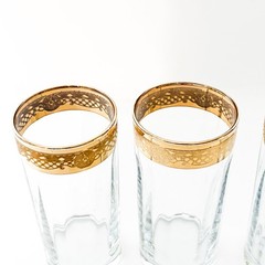 4 Mid-Century Gold Gilt Rim Highball Glasses Paneled Glass Ornate Band 5.25 tall