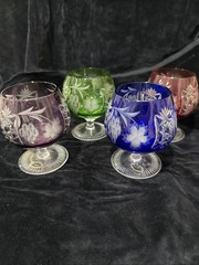 FOUR AJKA MARSALA MULTICOLOR LEAD CRYSTAL BRANDY GLASSES, 1980’s STICKER ON