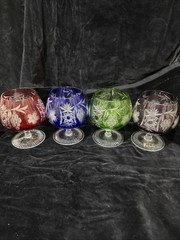 FOUR AJKA MARSALA MULTICOLOR LEAD CRYSTAL BRANDY GLASSES, 1980’s STICKER ON