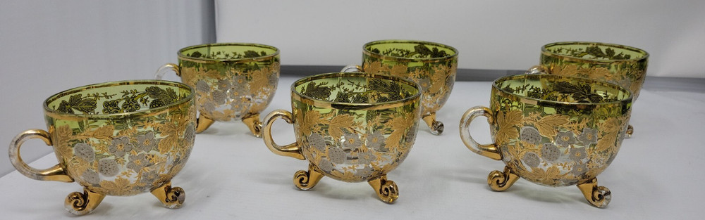 6 ANTIQUE MOSER GLASS 3 FOOTED HANDLED PUNCH CUPS WITH GILT FLORAL AND BERRIES