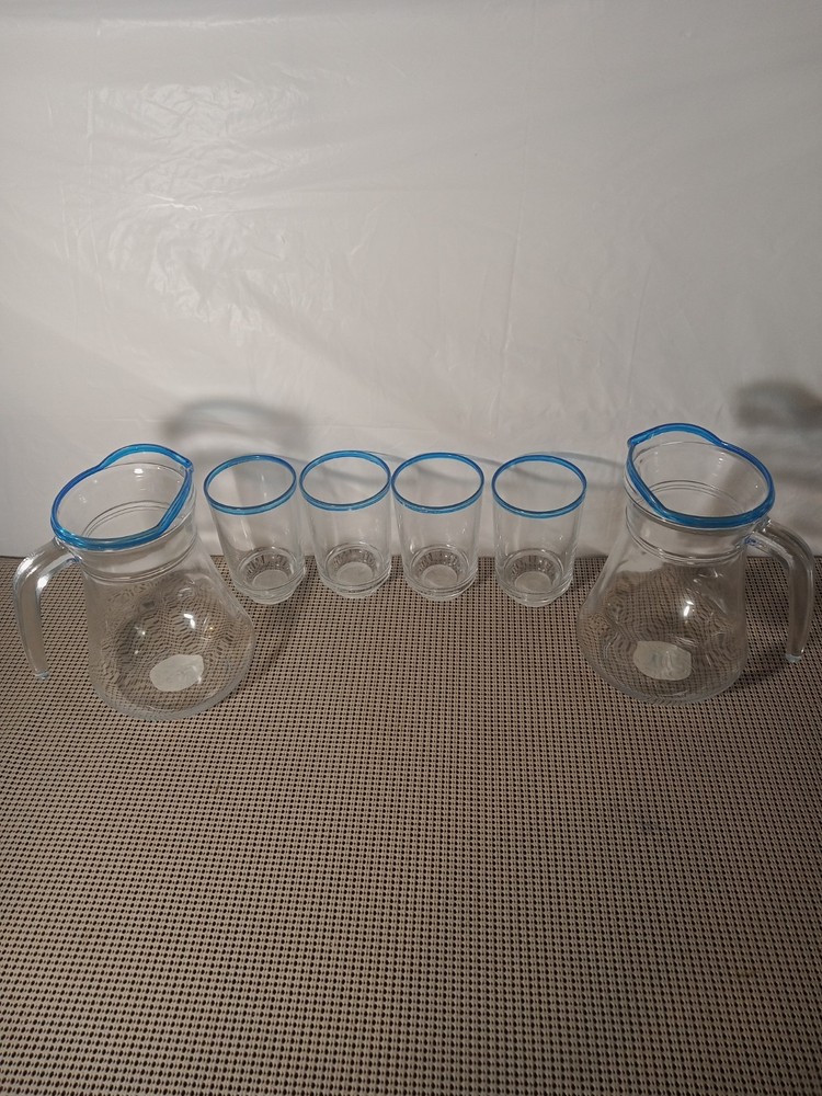 A Set of Lemonade Glasses 4 Cups and 2 Pitchers with Blue Stripes
