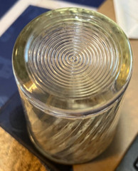 ANTIQUE CHILD’S—4″ SWIRL GLASS WITH METAL LID