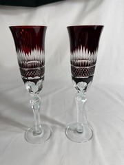 Pair of vintage Bohemian dark red cut to clear crystal Champagne flutes