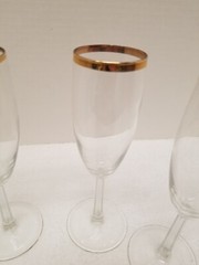 Four long stemmed gold rimmed wine glasses item no. 4-508