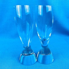 Nambe TILT two Champagne Flutes 7.5” Heavy Base Tilts Hard to Find Tiny Chip