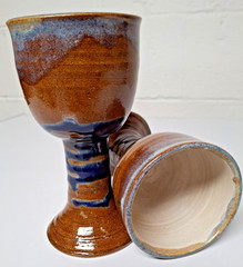 Pair signed Schaefer studio pottery goblets, brown blue, medium size