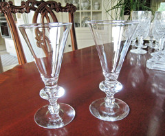 STEUBEN GLASS.. TWO 6″ RED WINE TRUMPET GLASSES..#7737. TEARDROP STEM.VERY NICE