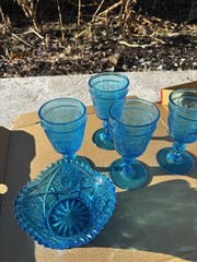 These items appear to be vintage pressed glass, specifically turquoise blue