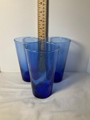 Three cobalt blue tumbler drinking glasses 6”