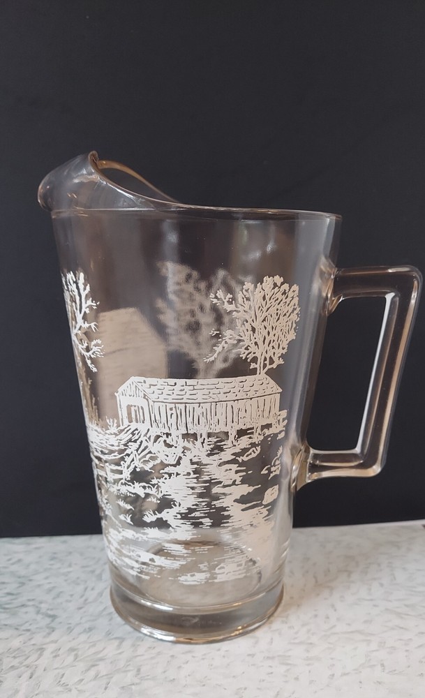 mcm Vintage water pitcher clear glass white embossed Mill and bridge scene 9.5″