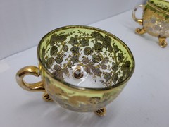 6 ANTIQUE MOSER GLASS 3 FOOTED HANDLED PUNCH CUPS WITH GILT FLORAL AND BERRIES