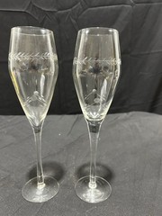 vintage Pair champagne flutes featuring an etched design