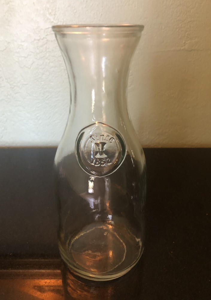 VINTAGE EMBOSSED «SINCE 1852» 9 1/2 IN HI GLASS WINE MILK BOTTLE CARAFE DECANTER