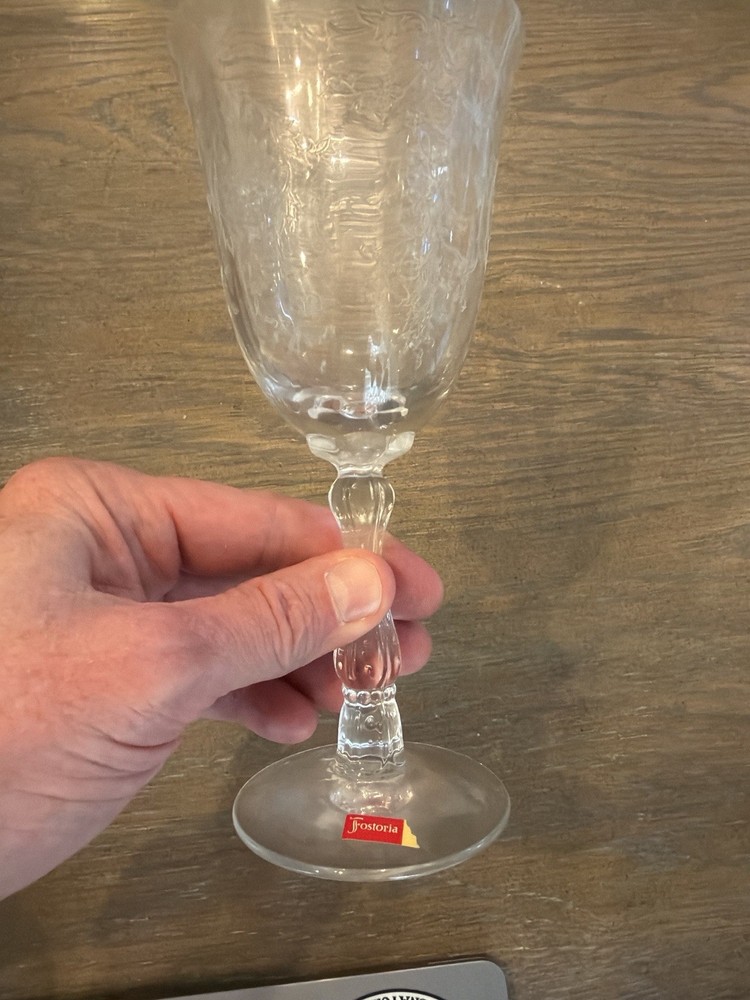 This is a vintage Fostoria “Navarre” etched crystal stemware glass