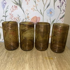 Set of four handmade Murano amber glass tumblers with swirling patterns