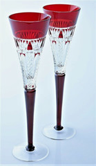 TWO WATERFORD 2015 TIMES SQUARE RUBY RED CUT TO CLEAR CHAMPAGNE FLUTES, MARKED