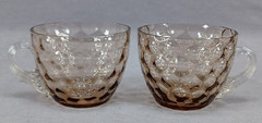 Pair of Late 19th Century Inverted Thumbprint Amber Glass Punch Cups