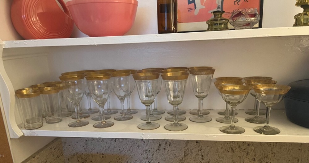 Vintage Tiffin-Franciscan gold-leaf-rimmed glassware set of 29
