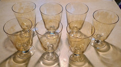 Vtg IRIDESCENT Amber GLASSES Footed Ball Stem Goblets 5.5″ tall SET OF 7 WORN!