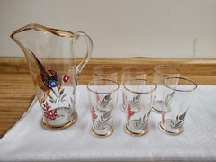 Vintage fish/sea life pitcher with 6 glasses set w/gold trim.