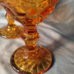 Amber colored glass pedestal goblets, Pair